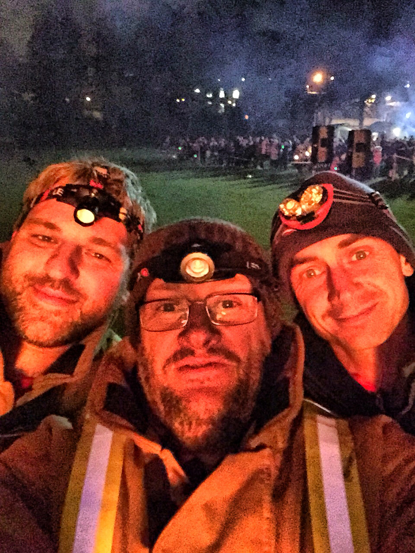  The boss and his crew warming up next to a bonfire in November 